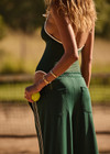 THE UPSIDE women's green recycled soft peached Racquet Flow Bodysuit is fully lined and features a scoop neckline, adjustable straps and a cream bow detail at chest. Made for tennis, gold & pickleball.