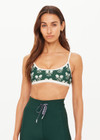 THE UPSIDE women's green Racquet Scoop Danni Bra features a contrast binded scoop neckline, adjustable straps and removable cups with a mini scallop trim at underbust. Made for tennis, golf & pickleball.