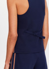 THE UPSIDE women's navy Toledo Greer Vest Top features tan knitted tape down sides, an adjustable waistbelt with buckle and tortoiseshell buttons. Made for lifestyle.