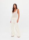 THE UPSIDE women's cream organic cotton Fenway Wales Knit Tank is designed for a relaxed basketball fit and features a ribbed neckline and armholes in contrast tan. Made for everyday.