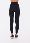 THE UPSIDE women's black recycled jacquard Castilla 25inch Legging is high-rise with a V panel waistband. Made for yoga & pilates.