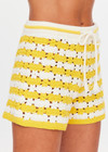 THE UPSIDE women's yellow organic cotton Goldie Malik Crochet Short is designed for a regular fit and features a hand crocheted flower design & an elasticated waist with tassel drawcord.
