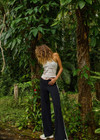 THE UPSIDE women's black Freya Knit Pant has a straight leg fit and features an elasticated waistband  and short splits at hem. Made for lifestyle.