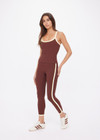 THE UPSIDE women's brown recycled rib Rhythm 25inch Legging has a mid-rise fit and features cream and yellow binds along side seams. Made for yoga & pilates.