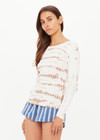 THE UPSIDE women's organic cotton rib Ayla Chrissy Long Sleeve Top is designed for a slim fit and features a brown hand tie dye design on a cream base. Made for lifestyle.