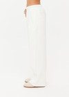 THE UPSIDE women's cream organic cotton terry Arkana Estelle Pant is designed for a relaxed fit with a barrel shaped leg and features an elasticated waistband and side pockets. Made for lifestyle.