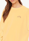 THE UPSIDE women's yellow organic cotton Paradise Coolum Crew is designed for an oversized fit, with discreet side seem pockets and ribbed neckline, cuffs and hem. Made for everyday wear.