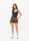 THE UPSIDE women's leopard recycled Ludlow Billie Run Short offers a mid-rise fit, designed with side seam pockets and an orange drawcord with rubber dipped ends. Made for running.