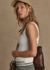 THE UPSIDE women's cream organic cotton Del Rey Pointelle Tank Top features a scooped lace trim neckline with a soft ribbed fabrication. Made for everyday wear.