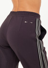 THE UPSIDE women's black Petra Flare Pant features soft, flared fabrication with grey splits at hem, side seam pockets and an elasticated waist. Made for lifestyle.