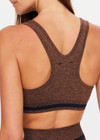 THE UPSIDE women's brown seamless Marle Seamless Jade Sports Bra offers full coverage with a scooped back, black stripe at underbust and removeable cups. Made for yoga & pilates.