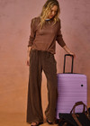 THE UPSIDE women's brown recycled cotton Soho Tokio Wide Leg Pant offers a high-rise with a wide leg design, elasticated waistband and front pockets in side seam. Made for lifestyle.
