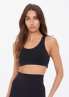 THE UPSIDE women's black recycled jacquard Castilla Jade Bra is a full coverage bra with scooped racerback and features removable cups. Made for yoga & pilates.