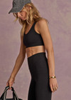 THE UPSIDE women's black recycled jacquard Castilla Jade Bra is a full coverage bra with scooped racerback and features removable cups. Made for yoga & pilates.