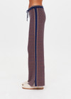 THE UPSIDE women's brown organic cotton Lumiere Juniper Knit Pant is a straight leg pant with a geometric star pattern, a soft elasticated waistband with drawcord and side seam pockets. Made for lifestyle.