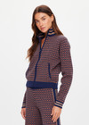 THE UPSIDE women's brown organic cotton Lumiere Margot Knit Jacket is a knitted long sleeve with a geometric star pattern, front pockets and contrast stripes around the sleeves. Made for lifestyle.