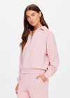 THE UPSIDE women's pink organic cotton french terry McGrath Collared Elle Polo is a relaxed, long sleeve polo with a collar and front buttons. Made for lifestyle.