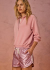 THE UPSIDE women's pink Mcgrath Billie Run Short is a mid-rise lightweight short in a metallic pink fabrication and features and side pockets and an elasticated waistband with drawcord. Made for lifestyle.