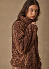 THE UPSIDE women's leopard recycled Harlow Fleece Pullover is designed for a relaxed fit and features a quarter zip, raglan sleeves, zip pockets, elasticated waist and cuffs. Made for lifestyle.