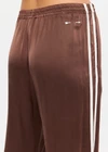 THE UPSIDE women's brown Marnie Silk Wide Leg Pant is true to size with high-rise fit, elasticated waistband, and cream side seam bindings. Made for lifestyle.
