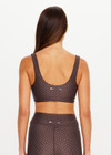 THE UPSIDE women's geo recycled supersoft Poet Harley Scoop Sports Bra offers a soft and supportive fit with scoop necklines, removable cups and a signature geo print. Made for yoga and pilates.