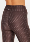 THE UPSIDE women's geo recycled supersoft Poet 25inch Midi Legging features a soft and supportive fit, mid rise waist, adjustable drawcord and signature geo print. Made for yoga and pilates.