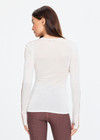 THE UPSIDE women's natural Merino Wool Long Sleeve Top is designed for a slim fit and features a crew neckline, contrast sleeve stripe and soft fine knit feel. Made for lifestyle.
