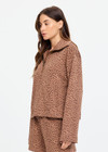 THE UPSIDE women’s leopard organic cotton Javan Jones Quarter Zip Sweat is designed for a regular fit and features dropped shoulders and a quarter zip neckline. Made for lifestyle.