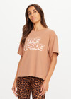 THE UPSIDE women’s brown 100% organic cotton Jacob Tee is designed for an oversized fit and features a ribbed collar and printed logo detail. Made for lifestyle.