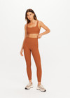 THE UPSIDE women’s brown recycled jacquard Mariana 25inch High Midi Legging offers a soft and supportive fit and features a high rise waist and V panel waistband. Made for yoga and pilates.