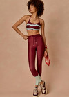 THE UPSIDE women’s tie dye recycled Rio 25inch Midi Legging offers a mid rise, drawcord waist and is printed in supersoft and breathable fabric. Made for yoga and pilates.