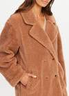 THE UPSIDE women’s brown recycled polyester Gracie Teddy Coat is a relaxed fit mid length coat and features a double breasted closure, welt pockets and faux shearling fabrication. Made for lifestyle.