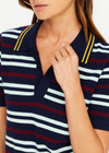 THE UPSIDE women’s stripe 100% organic cotton Archie Collared Knit Polo is true to size and features a striped rib collar, button front closure and ribbed hem. Made for tennis.