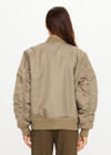 THE UPSIDE women's olive Tribute Bomber Jacket is a true to size style featuring a water resistant finish, paisley lining, ruched sleeve detailing and multiple utility pockets. Made for lifestyle.