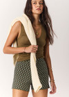 THE UPSIDE women's cream organic cotton blend Viva Jaya Knit Short features a mid rise fit and jacquard geo detailing with an embroidered arrow logo. Made for lifestyle.