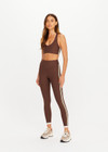 THE UPSIDE women's brown Daytona 25inch High Midi Legging is cut for a soft and supportive fit with a high rise waist, contrast side stripe detailing and cuffed hems. Made for yoga and pilates.