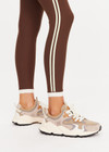 THE UPSIDE women's brown Daytona 25inch High Midi Legging is cut for a soft and supportive fit with a high rise waist, contrast side stripe detailing and cuffed hems. Made for yoga and pilates.
