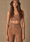 THE UPSIDE women’s leopard recycled peached Javan Jade Sports Bra is designed for a supportive fit and features a full coverage shape, racerback and removable cups. Made for yoga and pilates.