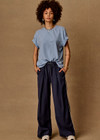 THE UPSIDE women's navy Lago Elita Pant is designed for a true-to-size mid rise fit and features a wide leg silhouette, side pockets and an adjustable drawcord waist. Made for lifestyle.