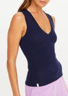 THE UPSIDE women's navy organic cotton Abby V Neck Tank Top features a low V neckline, ribbed construction and a high back design. Made for lifestyle.