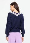 THE UPSIDE women's navy linen cotton blend Bonita V Neck Knit features a regular fit and dropped shoulders, striped neckline detailing and ribbed trims. Made for lifestyle.