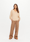 THE UPSIDE women’s sand linen organic cotton Bonita V Neck Knit is designed for a regular fit and features a wide neckline, dropped shoulders and ribbed trims. Made for lifestyle.