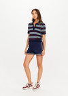 THE UPSIDE women’s navy recycled polyester Cleopatra Short features a mid rise elasticated waistband, curved hem with side splits, back pockets and contrast stripe tape detail. Made for lifestyle.