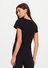 THE UPSIDE women's black organic cotton Avalon Crew Neck Baby Tee is a everyday staple made from soft organic cotton jersey and finished with an embroidered arrow logo at back. The perfect everyday tee, made to last.