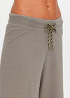 THE UPSIDE women's khaki organic cotton Sandy Wide Leg Track Pant is cut in a relaxed shape with an elasticated waistband and olive paracord drawcord. The perfect everyday track pant, made to last.