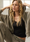 THE UPSIDE women's khaki organic cotton Jude Crop Hoodie is cut in a relaxed, slightly cropped silhouette and features a zip-through opening, a hood with a olive drawcord, ribbed cuffs and hem and front welt pockets. The perfect everyday hoodie, made to last.