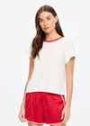 THE UPSIDE women's cream hemp cotton Dusty Ray 70'S Tee is true to size and features a contrast red neckline. Made for everyday wear.