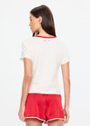 THE UPSIDE women's cream hemp cotton Dusty Ray 70'S Tee is true to size and features a contrast red neckline. Made for everyday wear.