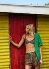 THE UPSIDE women's Laguna Klio Short is designed for a relaxed fit and features an elasticated waistband and a green drawcord in our Laguna palm print. Made for lifestyle.