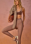 THE UPSIDE women's check Palacio 25inch Midi Pant is mid-rise with soft recycled peached fabric and mushroom drawcord. Made for yoga and pilates.
